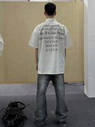 TRIANGLE PROJECT Distressed Dirty Wash Micro Flare Jeans in Denim - On Model