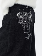 MEDM Embroidered Raw Denim Straight Leg Jeans in Blue - On Female Model