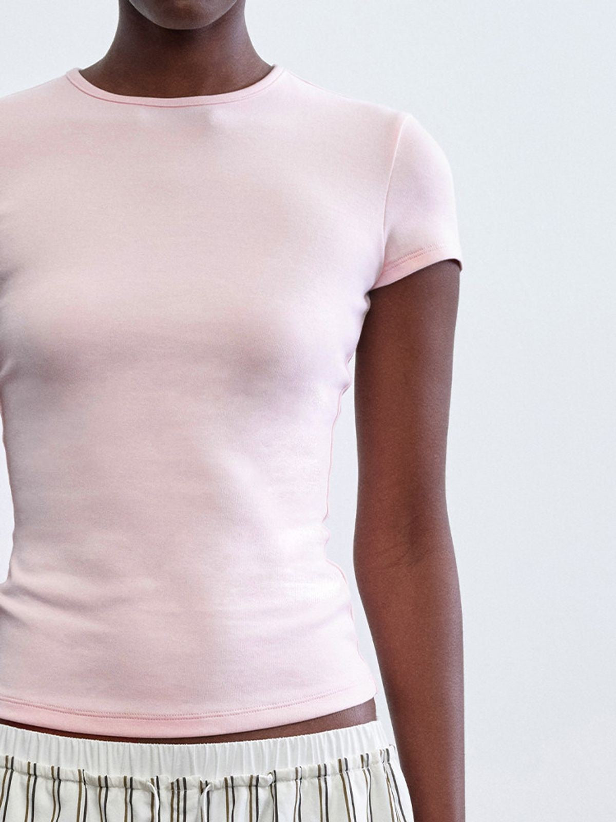 RARELY ALIKE Hourglass Cotton Crew Neck Tee in Pink - On Model