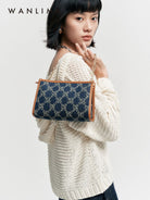 WANLIMA Monogram Denim Chain Crossbody Bag in Denim - On Female Model