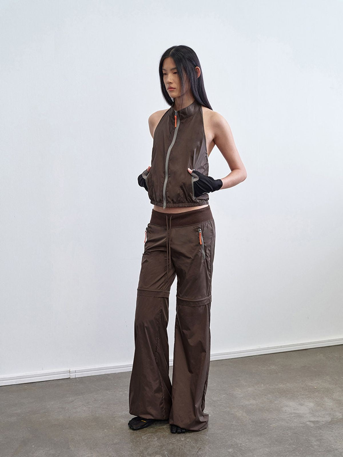 RARELY ALIKE Detachable Sleeve Nylon Jacket in Brown - On Model