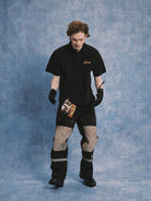 SOD Strip Poker Graphic Cotton Polo in Black - On Model