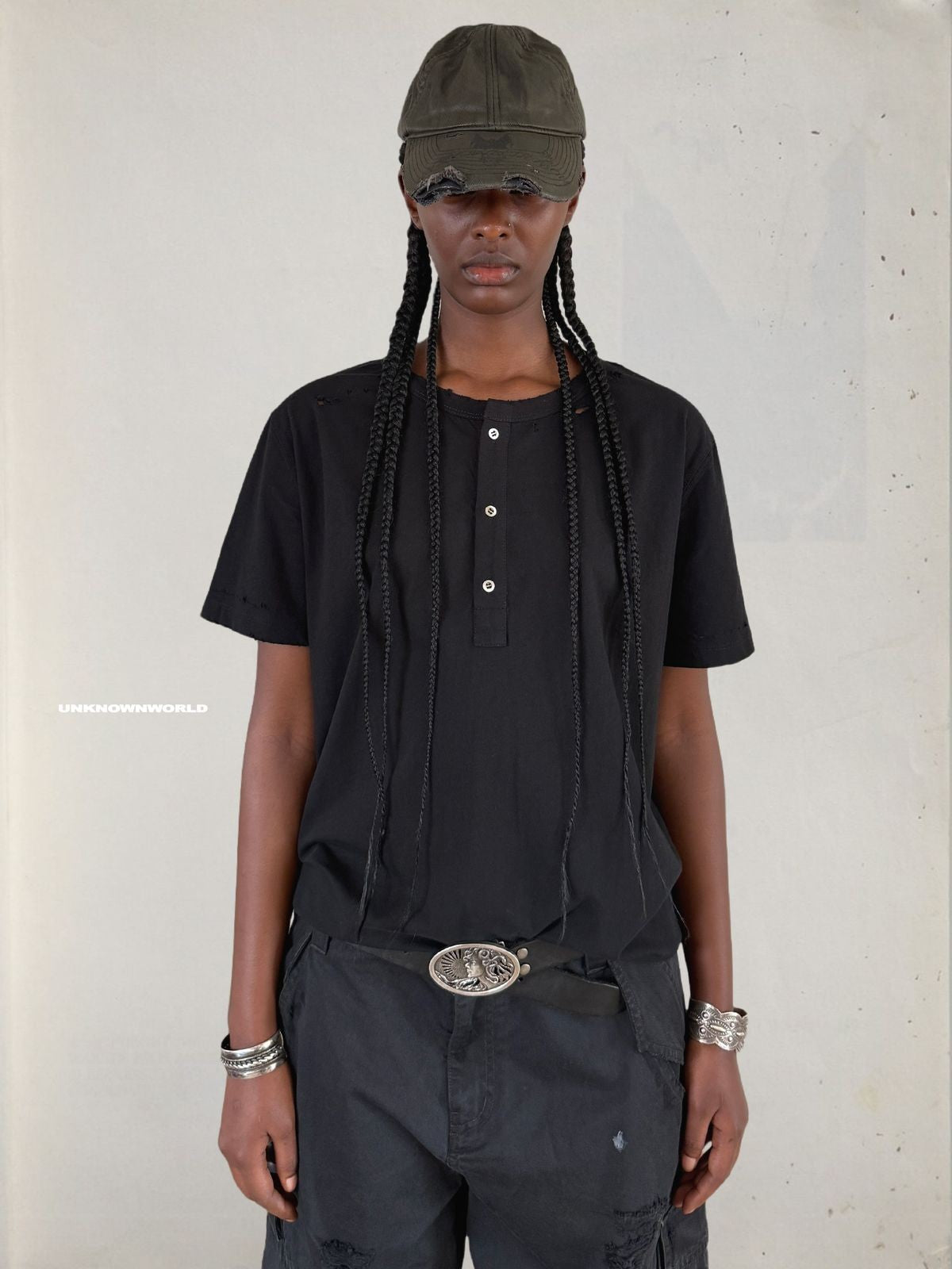 UNKNOWNWORLD Distressed Cotton Henley T Shirt in Black - On Model