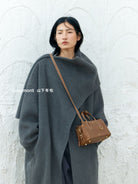 Songmont Mini Vegetable Tanned Leather Boston Bag in Brown - On Model