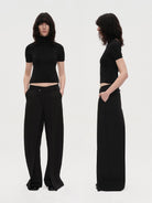 rarely alike Open Back Wool Turtleneck in Black - On Model