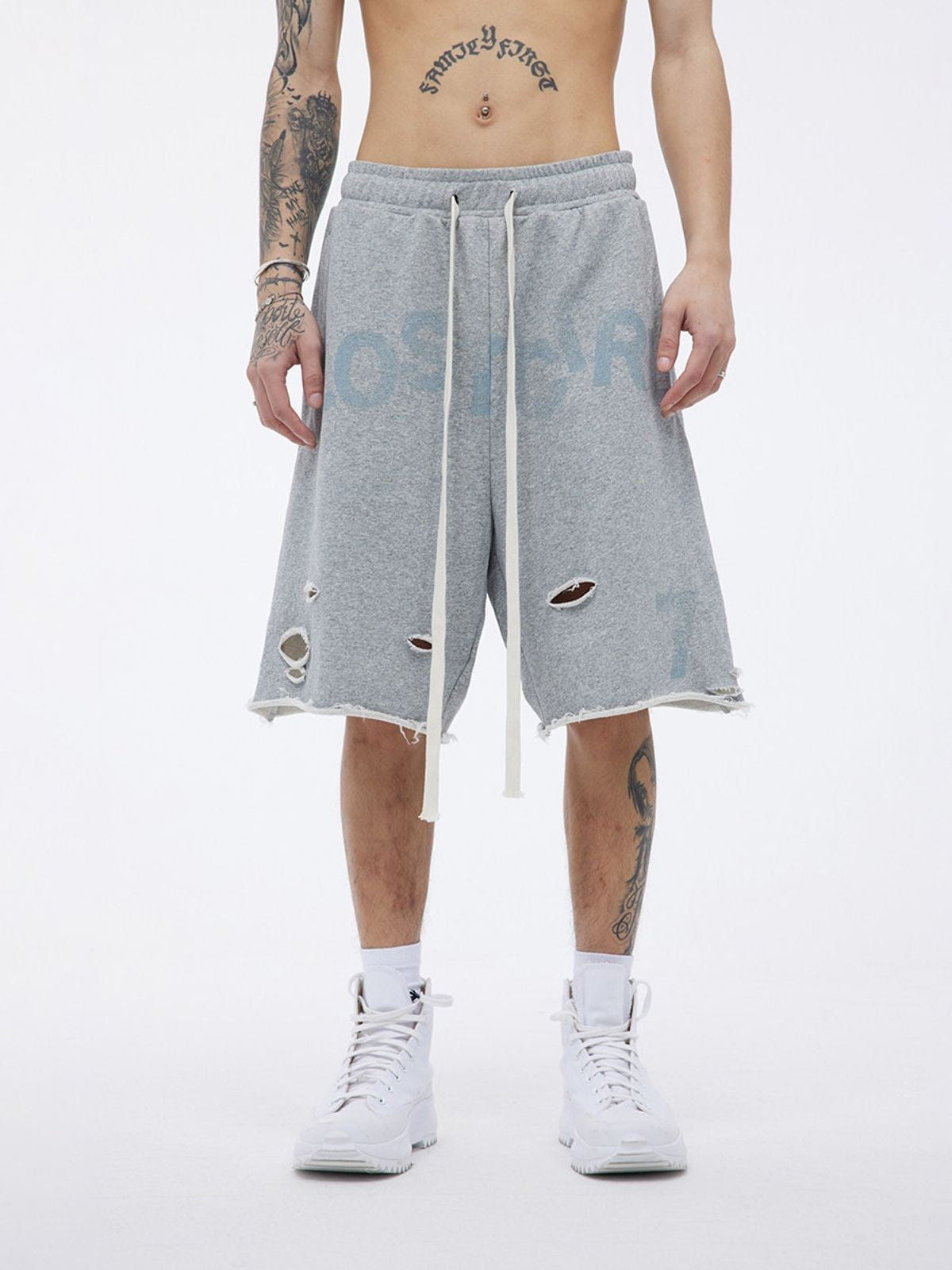 LOSTCTRL Raw Hem Distressed Cotton Shorts in Gray - On Model