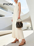 FION Monogram Canvas Drawstring Bucket Bag in Brown - On Female Model