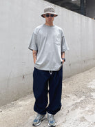 SODA Nylon Tapered Training Pants in Navy Blue - On Model