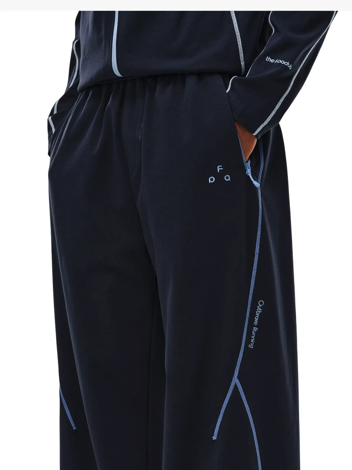 FPA Contrast Stitch Fleece Pants in Navy Blue - On Female Model
