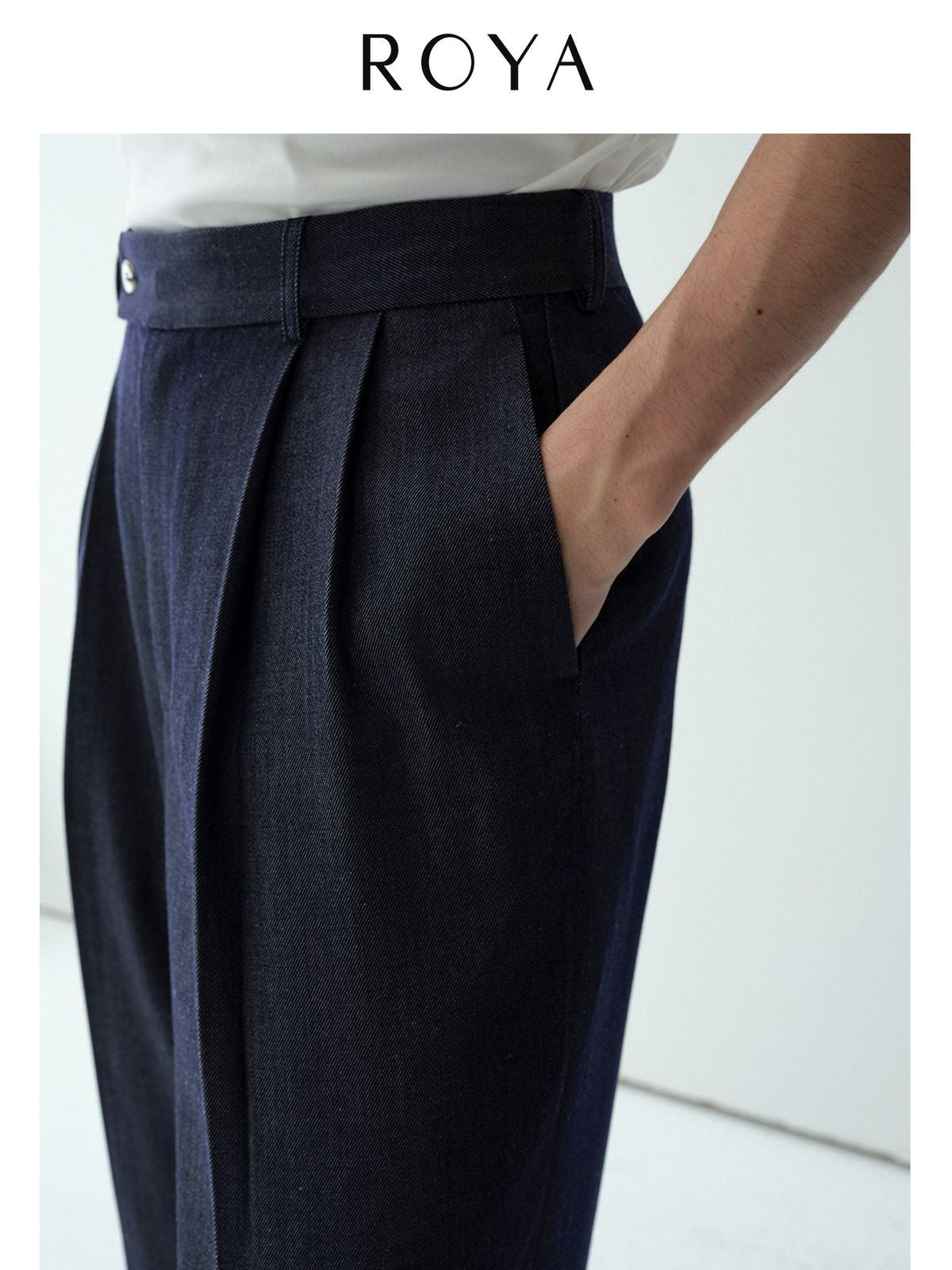 ROYA Pleated Silk Blend Denim Trousers in Blue - On Male Model