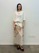 NeverSeez Snake Bow Print T Shirt in White - On Model