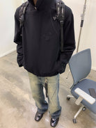 NeverSeez Distressed Washed Micro Flare Jeans in Blue - On Model