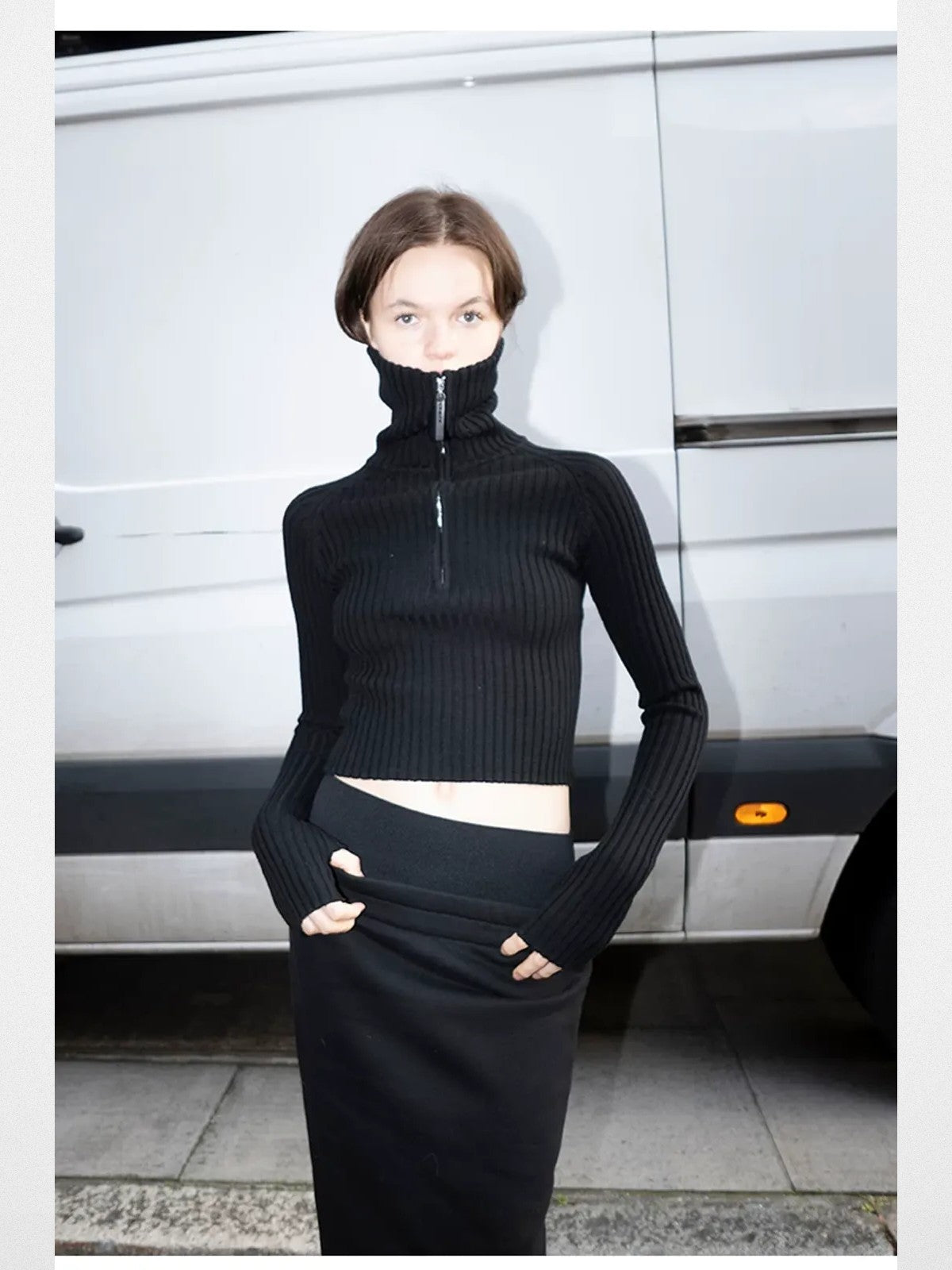 RARELY ALIKE Zip Up High Neck Wool Knit in Black - On Model