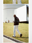 MEDM Wool Blend Varsity Jacket in Black - On Model