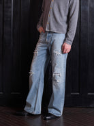 VLABMADE Distressed Sashiko Flare Jeans in Blue - On Male Model
