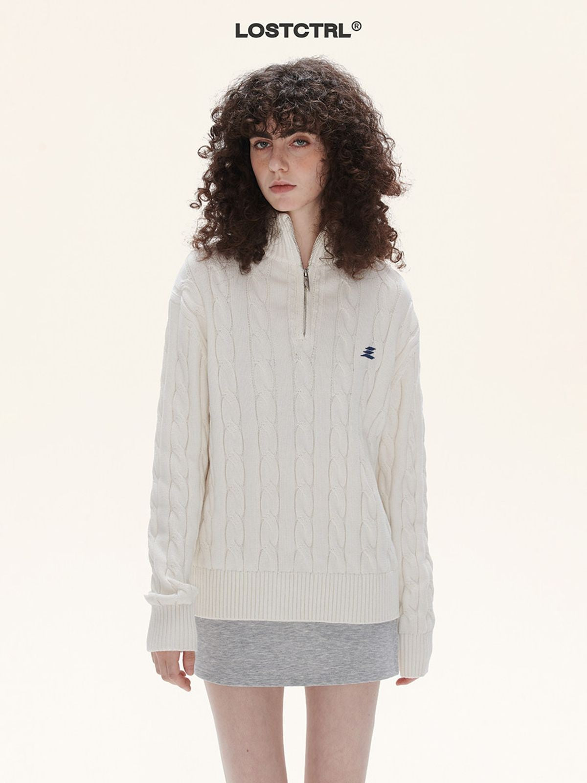 LOSTCTRL Half Zip Cable Knit Cotton Sweater in White - On Model