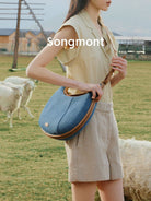 Songmont Denim Leather Crescent Bag in Blue - On Model