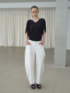 RARELY ALIKE Tie Back Lyocell Batwing Top in Black - On Model