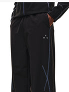 FPA Curved Leg Nylon Trousers in Black - On Model