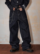 MEDM Raw Denim Contrast Stitch Jeans in Blue - On Model