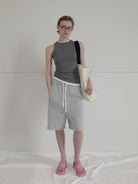 RARELY ALIKE Seamed Cotton Sweat Shorts in Gray - On Model