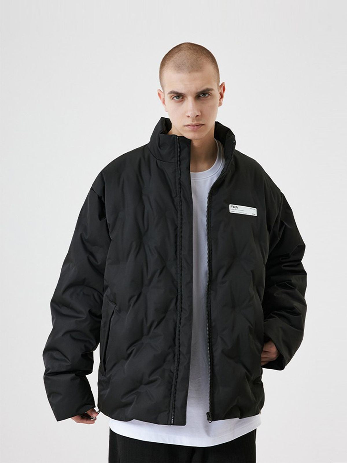 FPA Diamond Quilted Down Puffer in Black - On Male Model