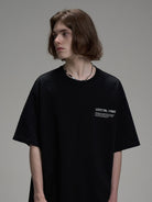 LOSTCTRL Heavyweight Graphic Print T Shirt in Black - On Male Model