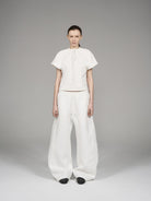 Blindnoplan Heavyweight Curved Leg Sweatpants in White - On Model