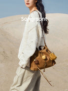 Songmont Suede Baina Hobo Bag in Brown - On Female Model