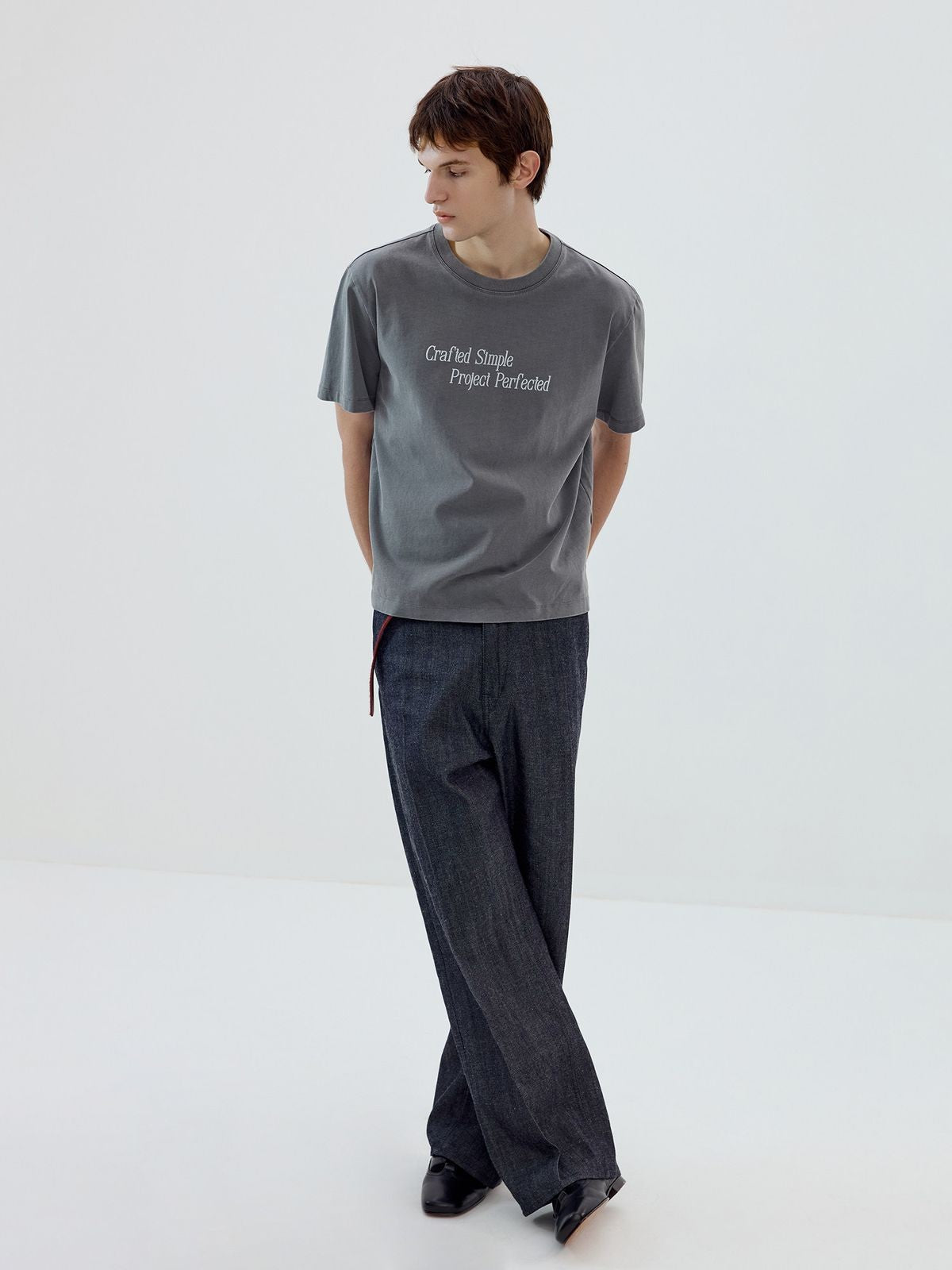 Simple Project Garment Dyed Slogan T Shirt in Gray - On Male Model
