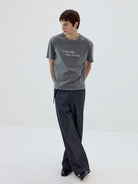 Simple Project Garment Dyed Slogan T Shirt in Gray - On Male Model