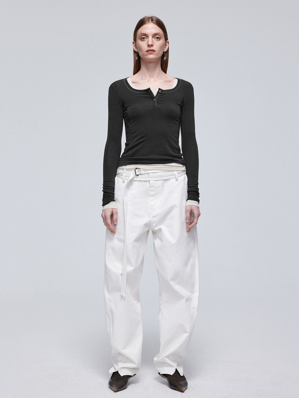 Simple Project Twisted Belt Curved Leg Pants in White - On Female Model