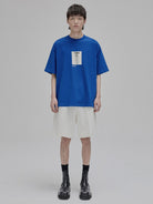 NANS Silent Growth Floral Print T Shirt in Blue - On Model