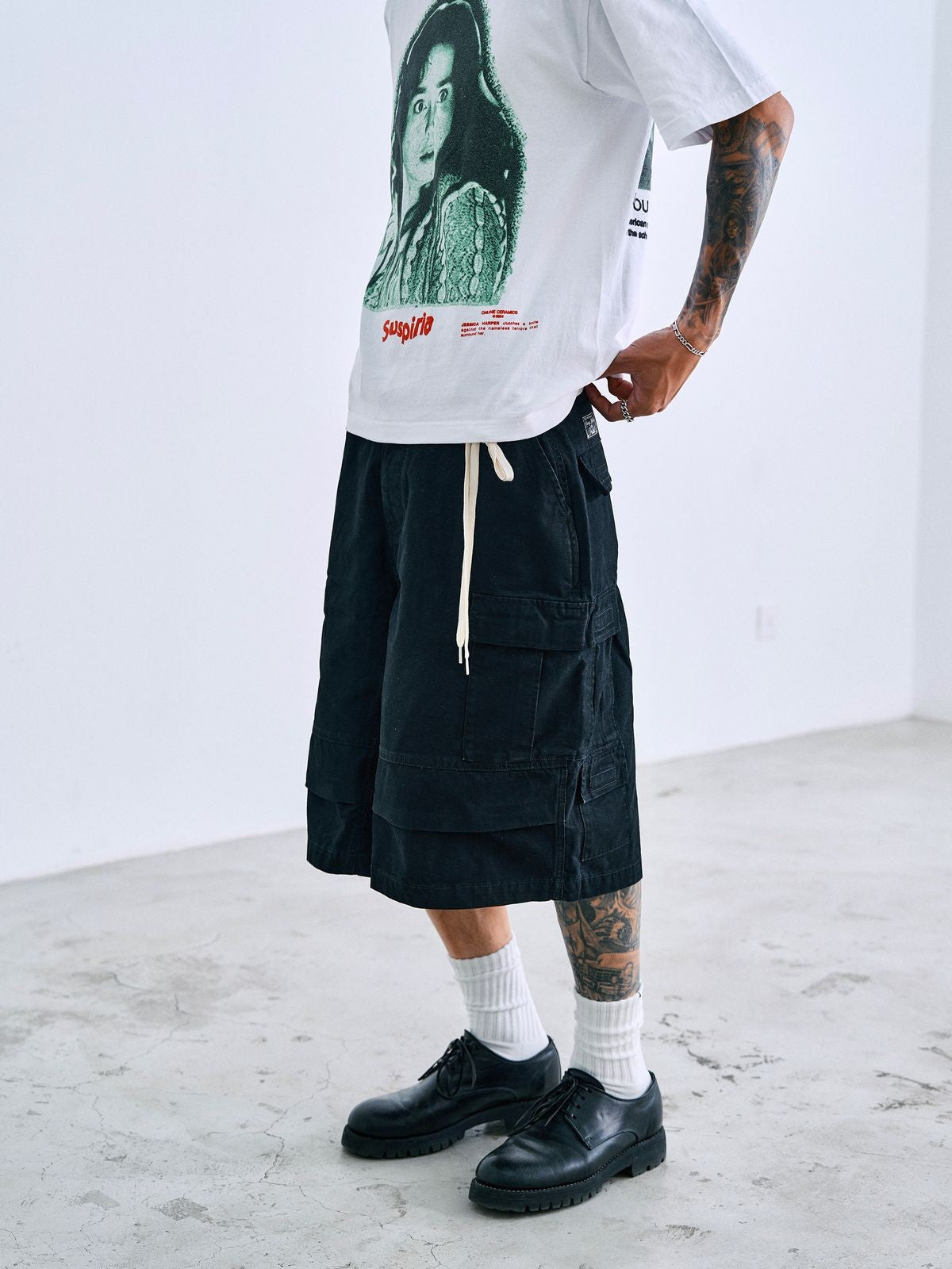 SWFI Distressed Wide Leg Cargo Shorts in Black - On Model