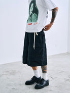 SWFI Distressed Wide Leg Cargo Shorts in Black - On Model