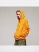 LOSTCTRL Embroidered Raw Edge Cotton Hoodie in Orange - On Model