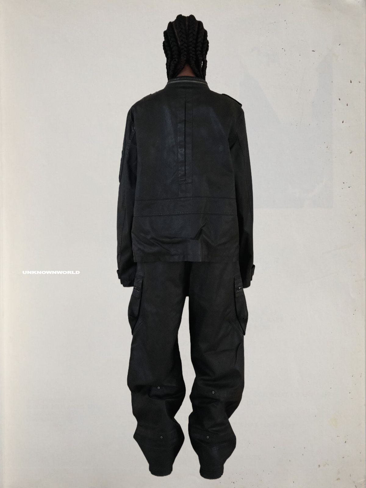 UNKNOWNWORLD Waxed Deconstructed M65 Jacket in Black - On Model