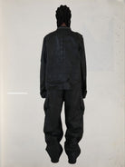 UNKNOWNWORLD Waxed Deconstructed M65 Jacket in Black - On Model
