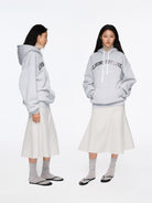 RARELY ALIKE Living Offline Embroidered Fleece Hoodie in Gray - On Model