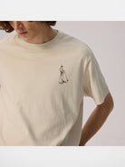 AFterTaste Garment Dyed Vintage Wash T Shirt in Cream - On Model