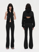 RARELY ALIKE Convertible Zip Up Hoodie in Black - On Model