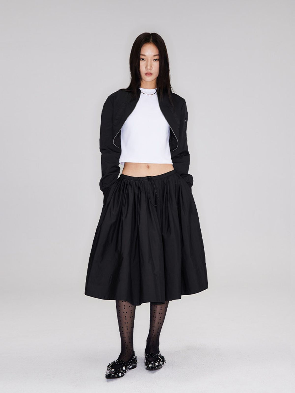 RARELY ALIKE Curved Hem Cropped Bomber in Black - On Model