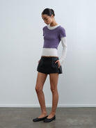 rarely alike Side Zip Faux Leather Mini Skort in Black - On Model