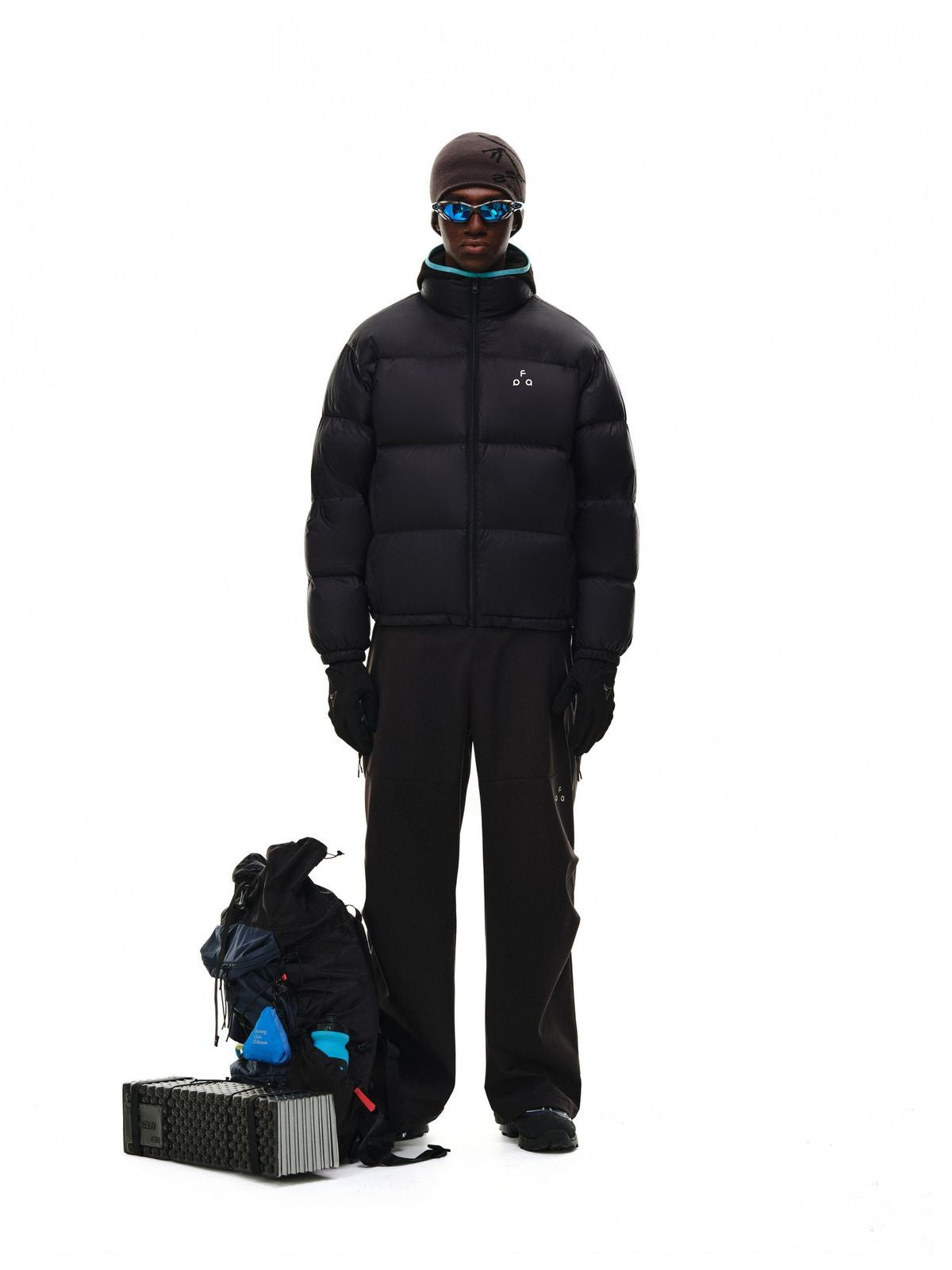 FPA Logo Print Down Puffer Jacket in Black - On Male Model