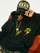 MEDM M Buckle Graphic Hoodie in Black - On Male Model