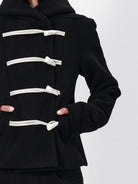 RARELY ALIKE Hooded Lamb Wool Toggle Coat in Black - On Model