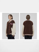 LOSTCTRL Patchwork Sherpa Varsity Jacket in Brown - On Model