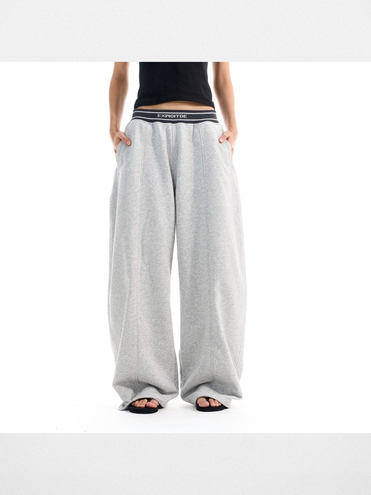 BLINDNOPLAN Curved Seam Wide Leg Sweatpants in Gray - On Female Model