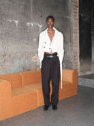 TRIANGLE PROJECT Deconstructed Double Breasted Jacket in White - On Model