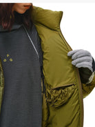 FPA Stand Collar Goose Down Puffer in Olive - On Female Model